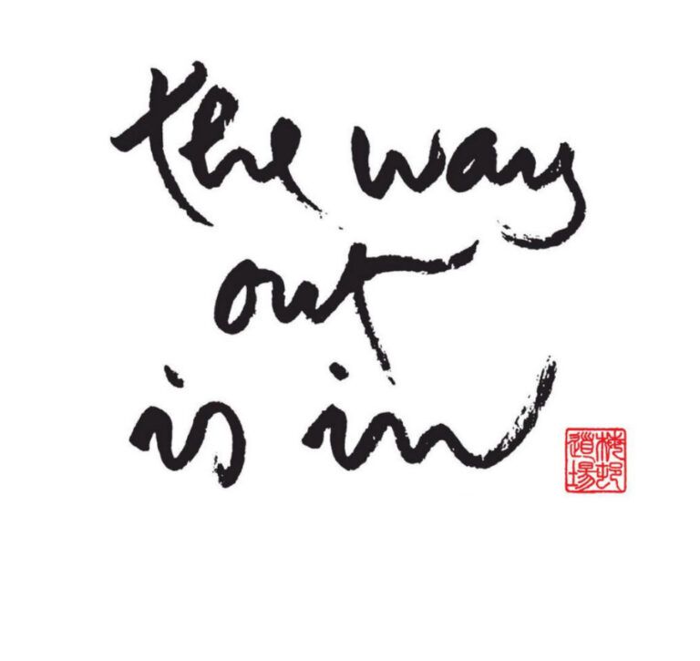 Calligraphy by Thich Nhat Hanh that says: The way out is in